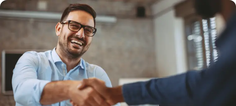 Business Associates shaking hands