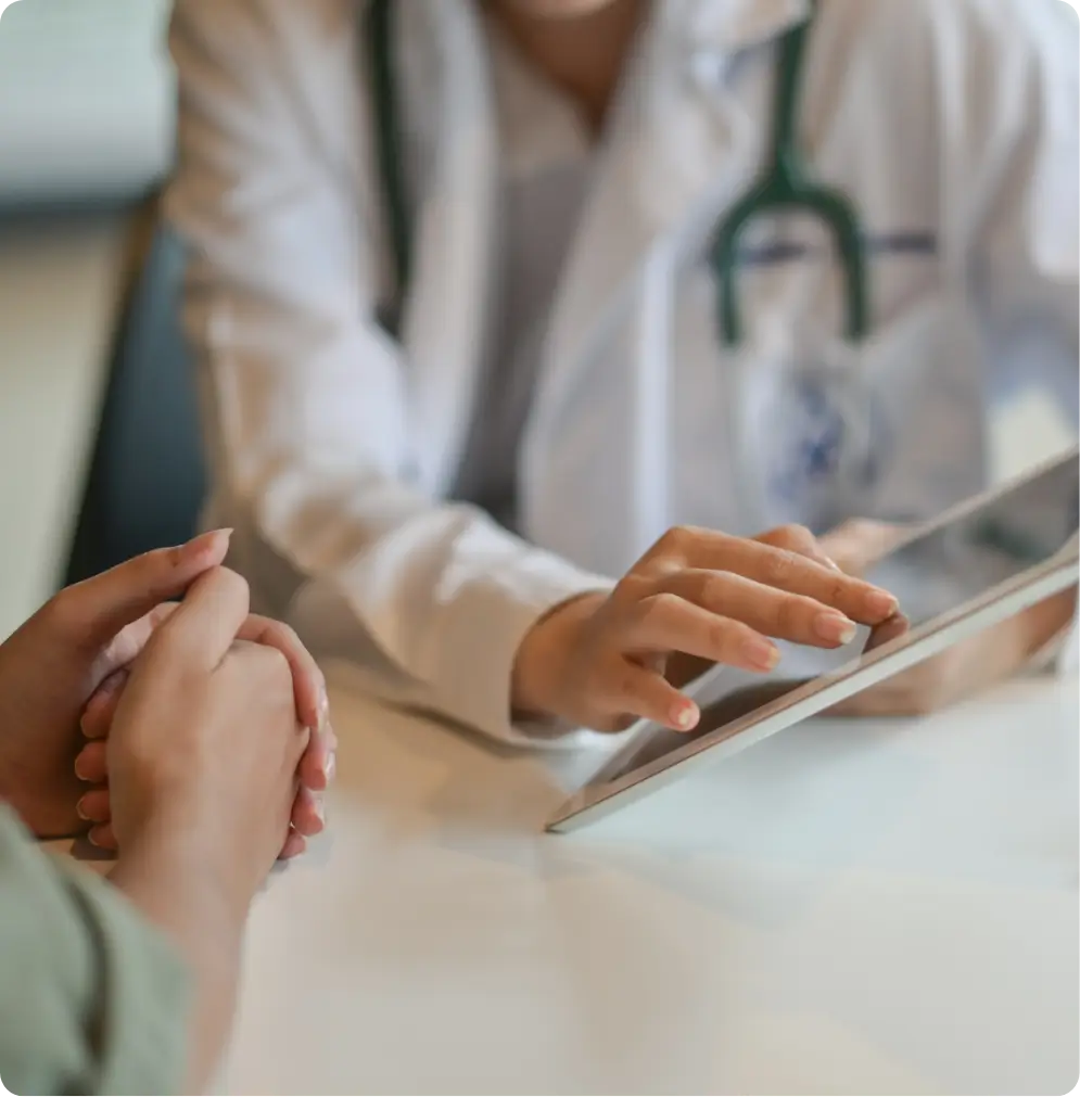 a doctor using a tablet