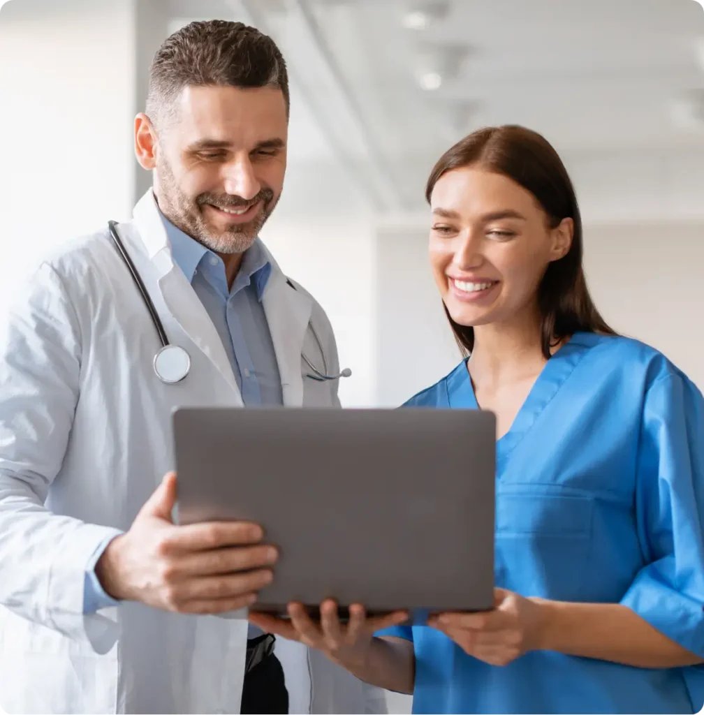 Doctor and nurse with laptop