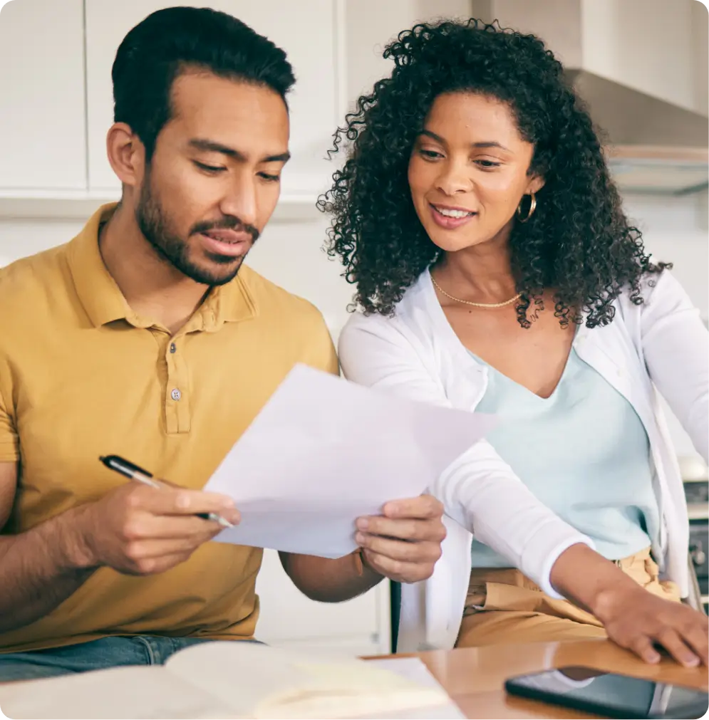 Couple looking over financial statements